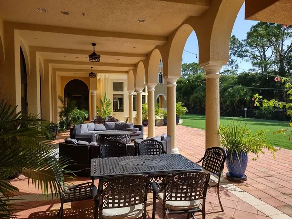 a view of balcony and yard