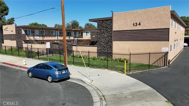 a car parked in front of a house