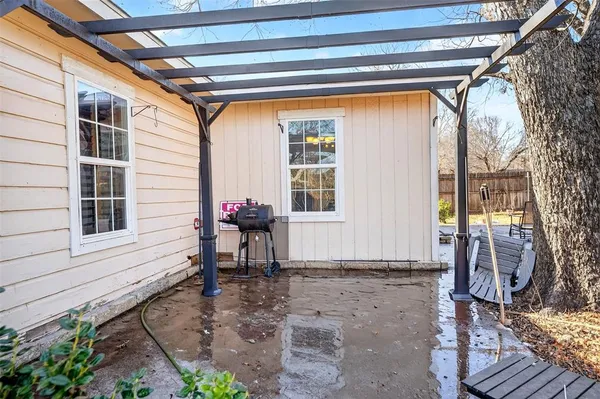 a backyard of a house with seating space