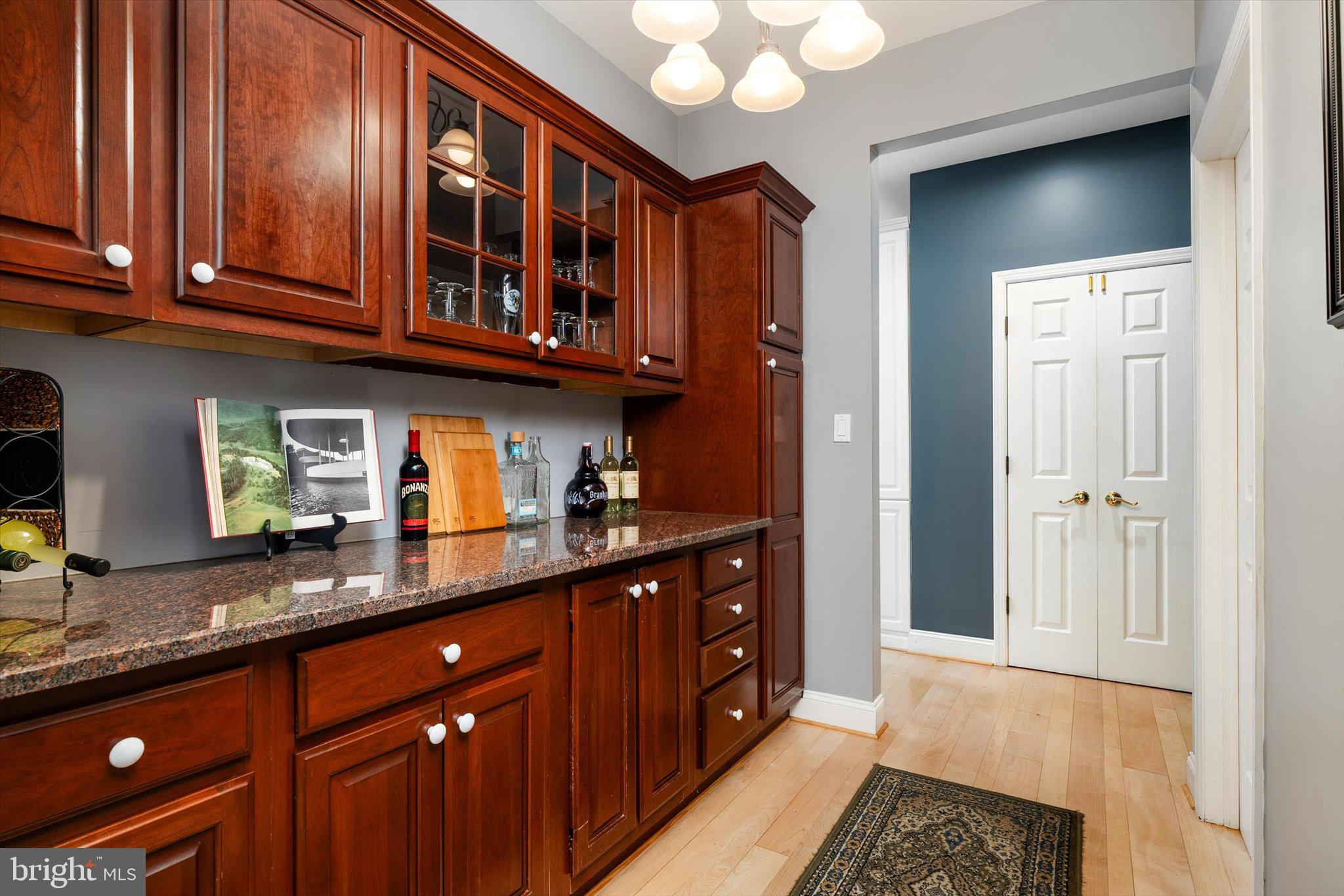 8 Carney Way Hamilton, NJ 08620 - Photo 15 of 66 Elegant kitchen with rich wood tones.