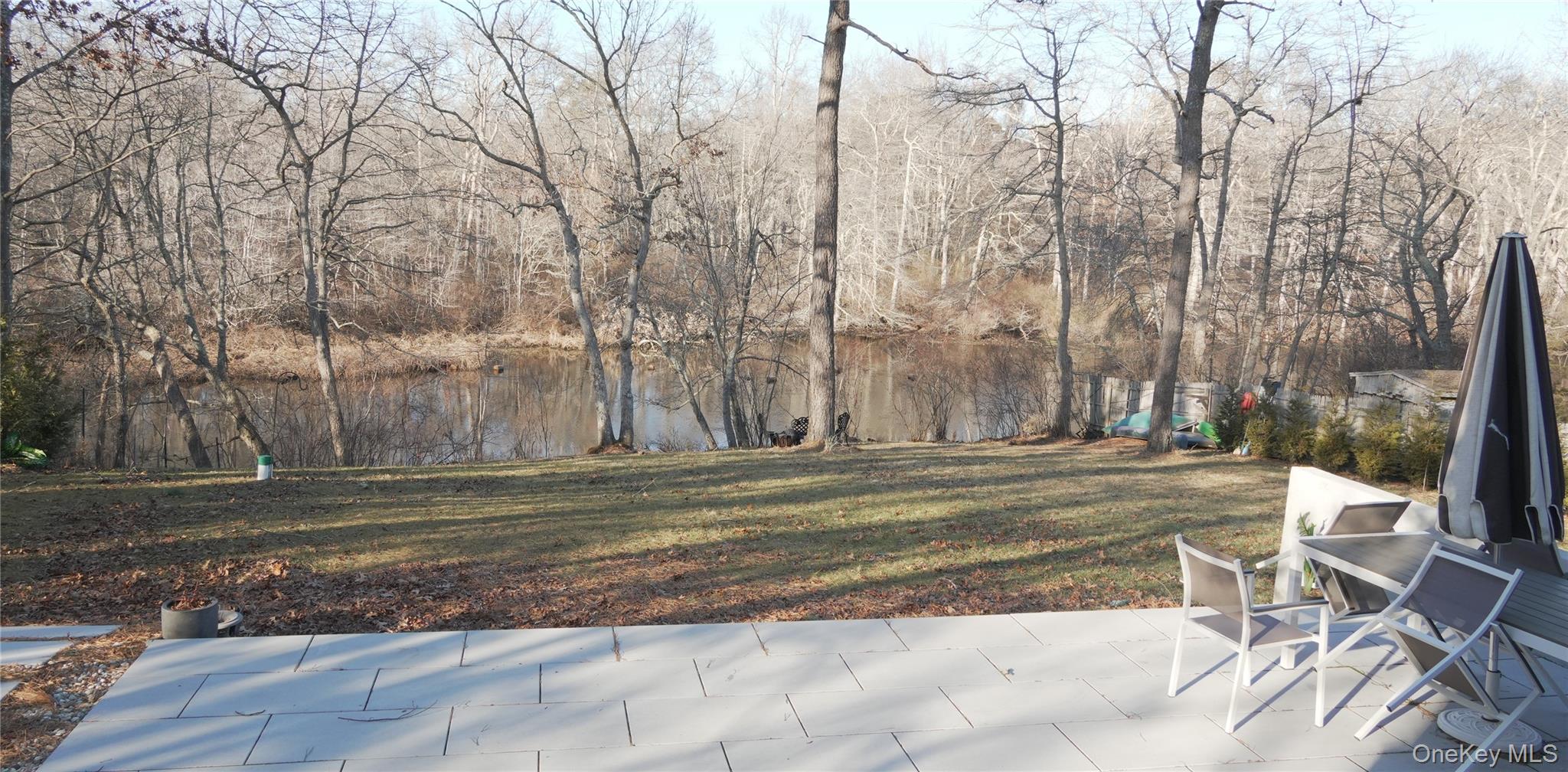 371 South River Road Calverton, NY 11933 - Photo 3 of 24 a view of a yard with trees