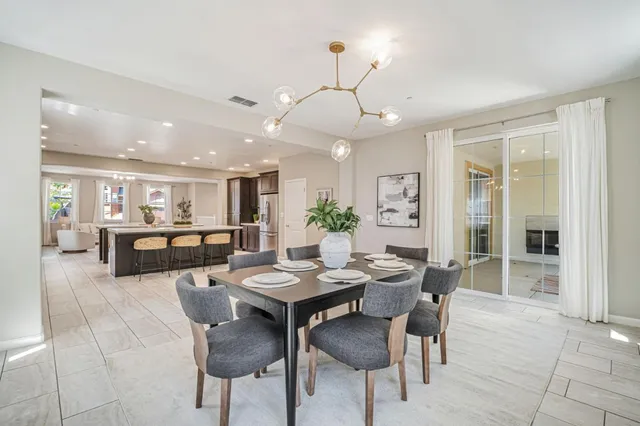 a bedroom with a bed and a mirror