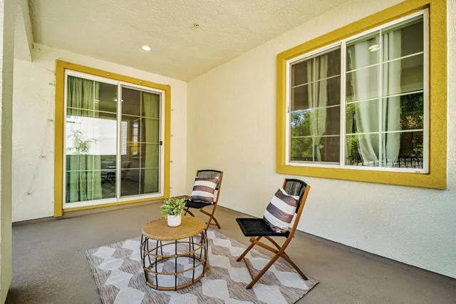 an aerial view of residential house with outdoor space and parking
