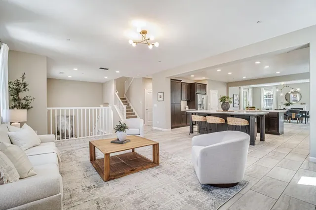 a view of a livingroom with furniture window and wooden floor