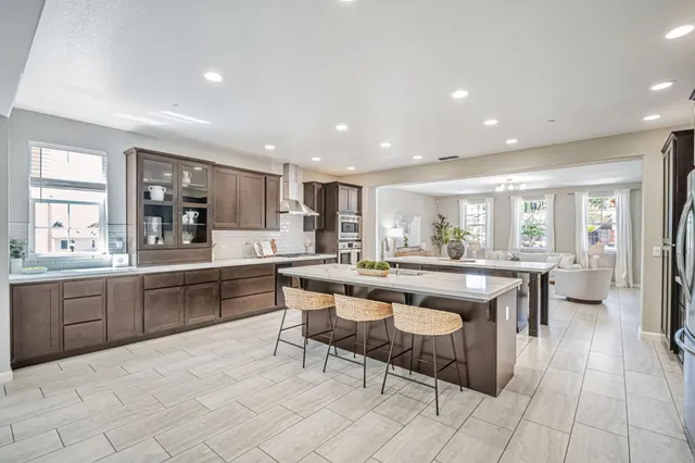a view of a dining room with furniture and window
