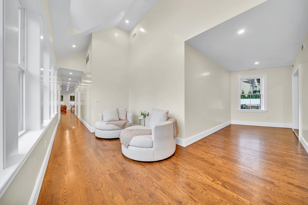 4 Lowell Street Lynnfield, MA 01940 - Photo 19 of 42 a living room with furniture and a wooden floor