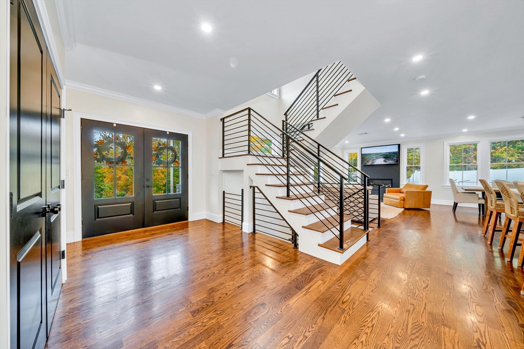 4 Lowell Street Lynnfield, MA 01940 - Photo 20 of 42 a living room with furniture and a wooden floor