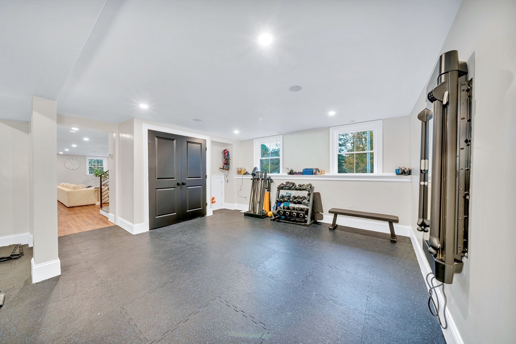4 Lowell Street Lynnfield, MA 01940 - Photo 29 of 42 a view of a livingroom with furniture and a window