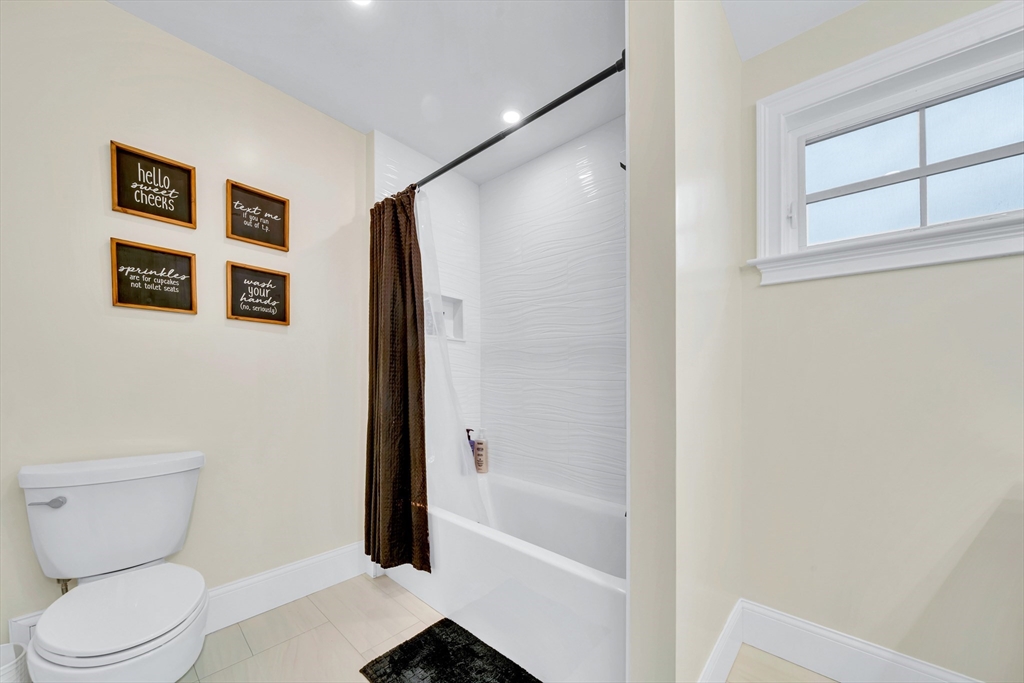 4 Lowell Street Lynnfield, MA 01940 - Photo 30 of 42 a bathroom with a toilet and a shower