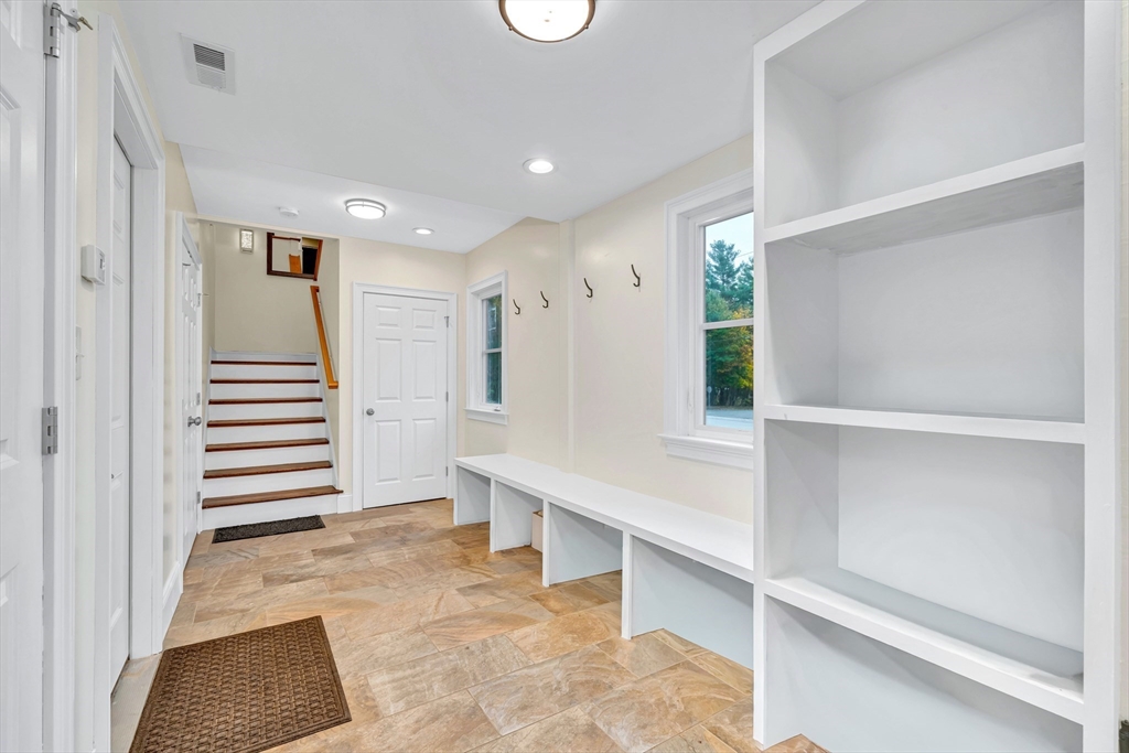 4 Lowell Street Lynnfield, MA 01940 - Photo 31 of 42 a view of entryway with stairs and furniture