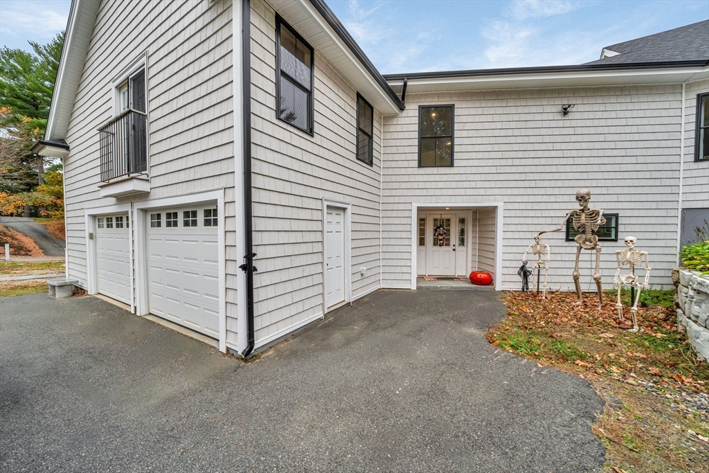 4 Lowell Street Lynnfield, MA 01940 - Photo 32 of 42 a view of a house with a yard