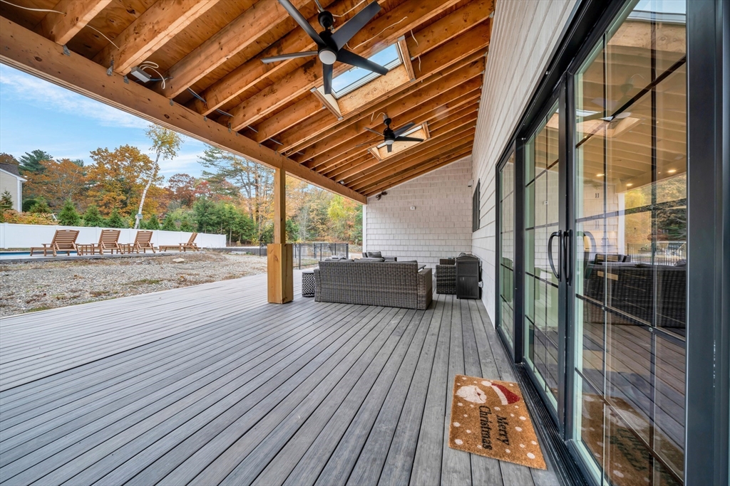 4 Lowell Street Lynnfield, MA 01940 - Photo 33 of 42 a view of a balcony with wooden floor