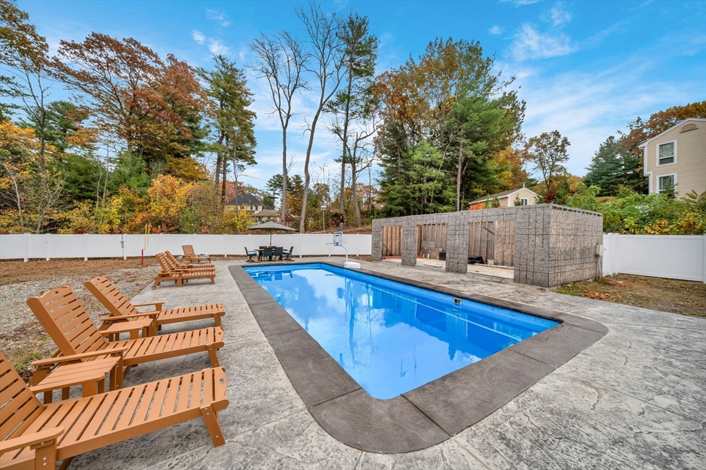 4 Lowell Street Lynnfield, MA 01940 - Photo 36 of 42 a view of sitting area with swimming pool and furniture