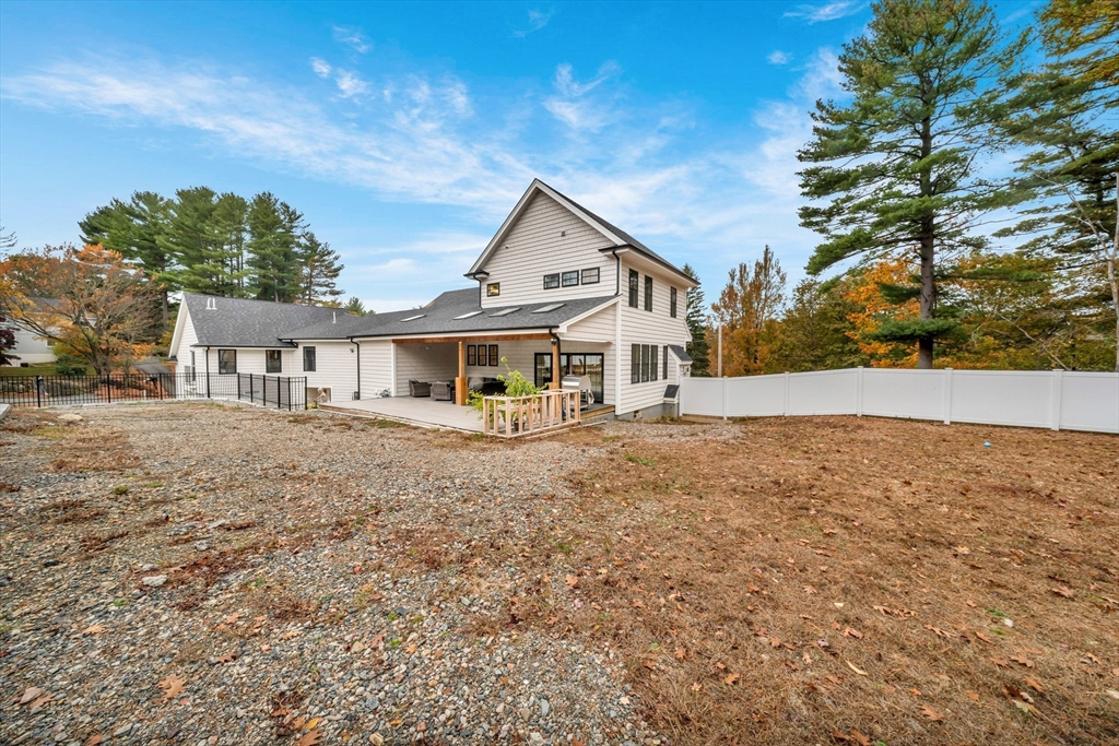4 Lowell Street Lynnfield, MA 01940 - Photo 37 of 42 front view of house with a yard