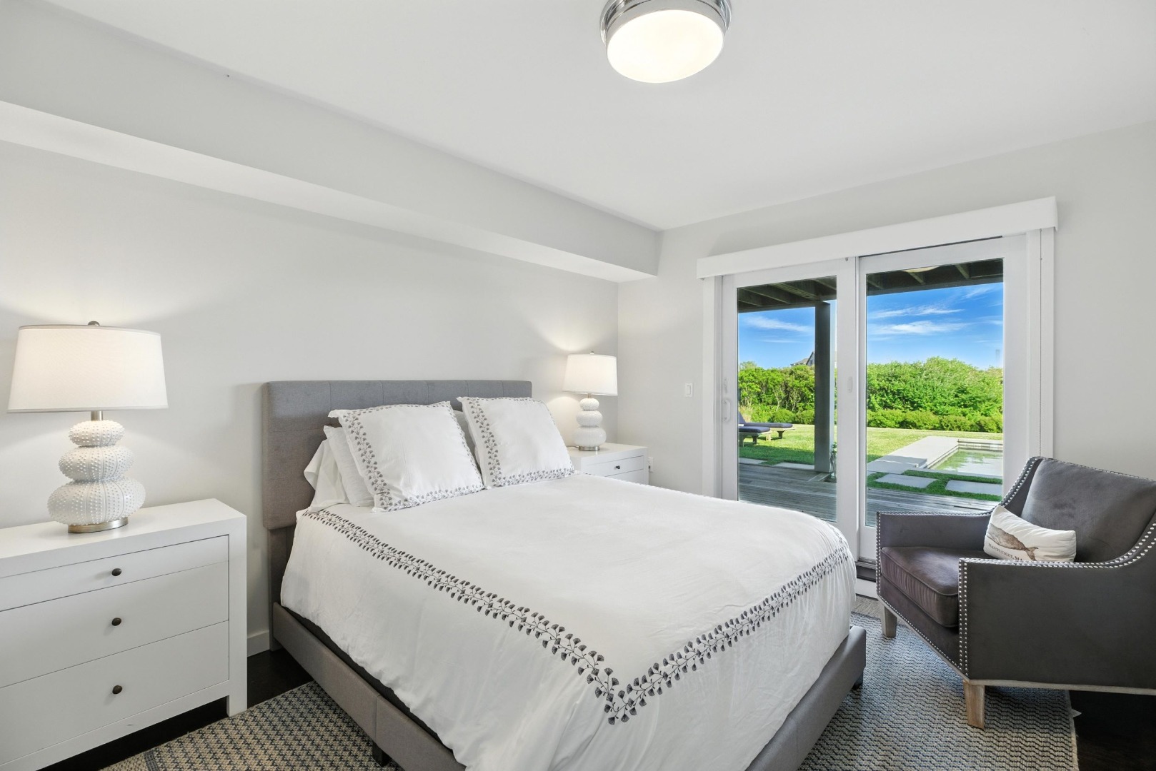 45 Starbuck Road Nantucket, MA 02554 - Photo 31 of 42 a bed room with a bed and a chair