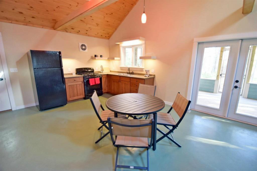 213 Tannery Brook Road Ellsworth, ME 04605 - Photo 10 of 35 Another view of kitchen and dining area.