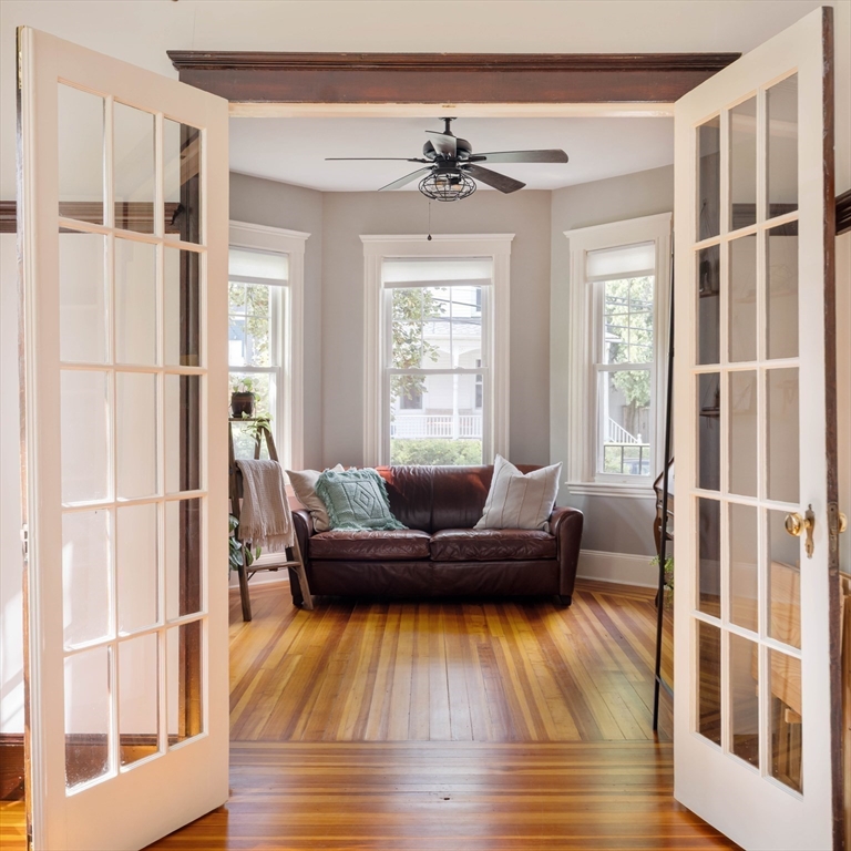 250 Poplar Street, Unit 1 Boston, MA 02131 - Photo 14 of 34 a living room with furniture and a large window