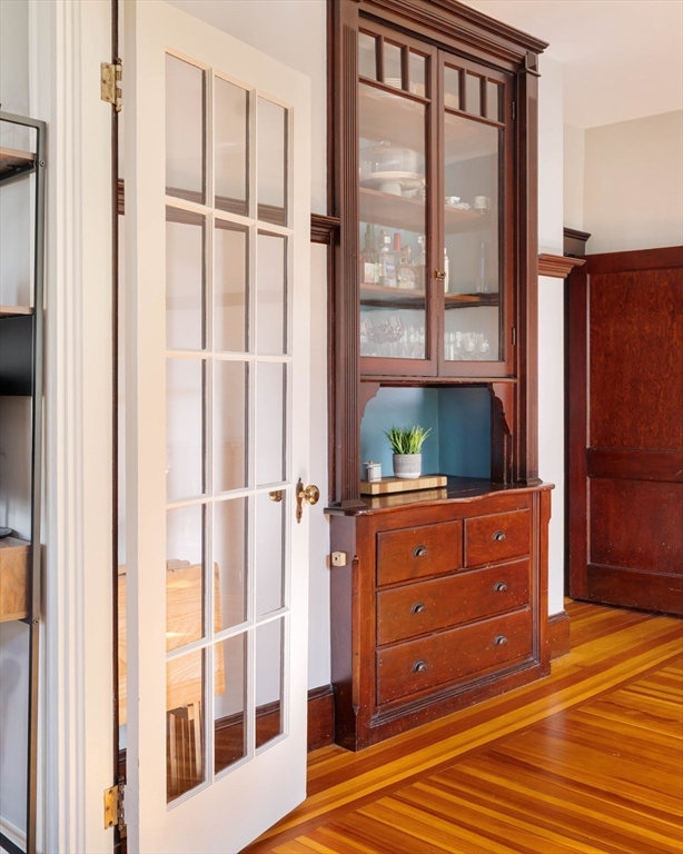 250 Poplar Street, Unit 1 Boston, MA 02131 - Photo 17 of 34 a room with a dresser and a window