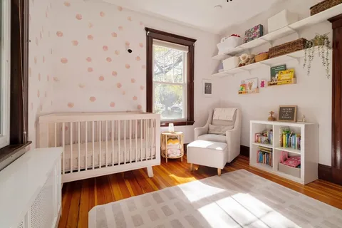 a bathroom with a sink a mirror a vanity and a bathtub
