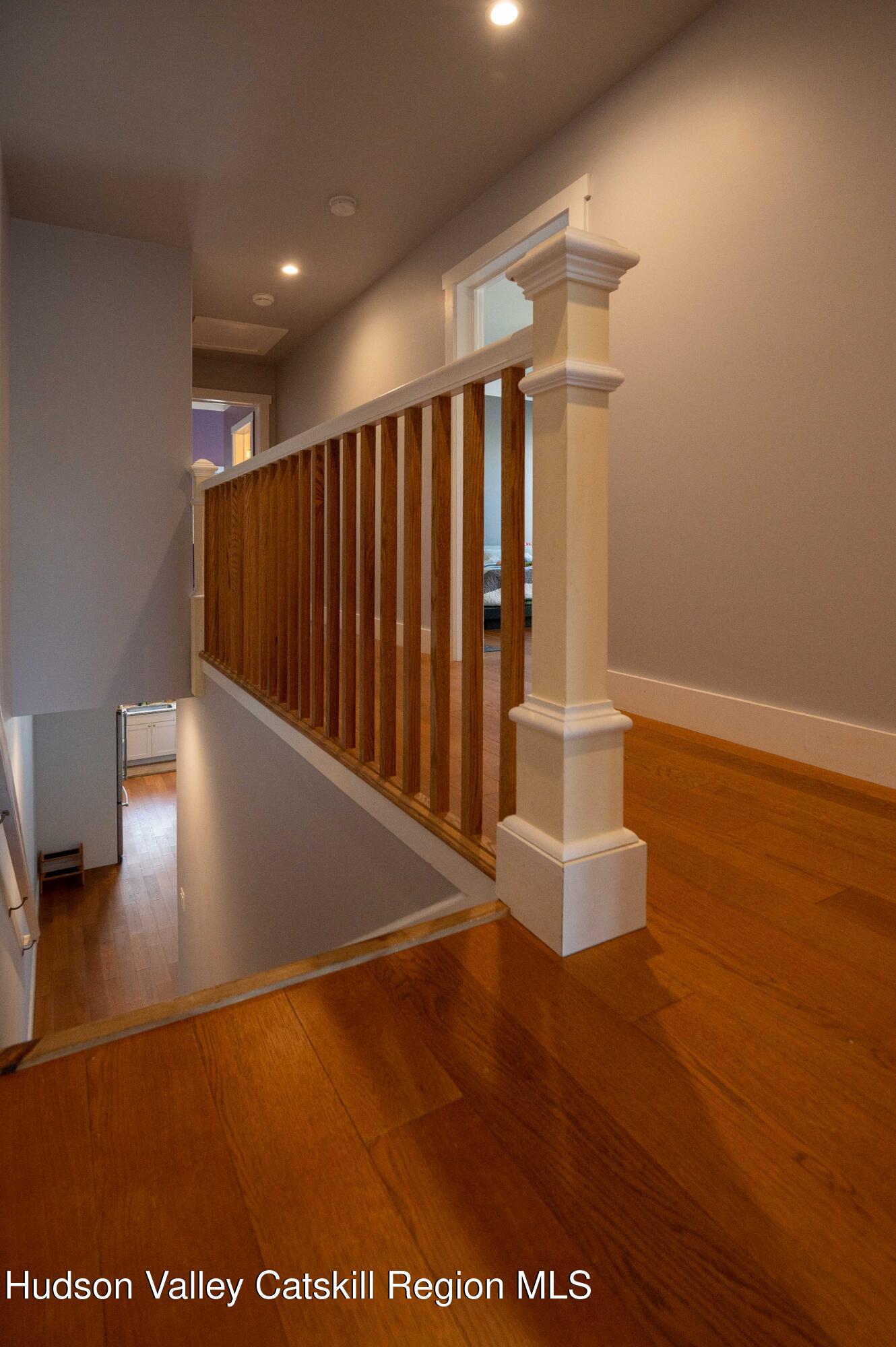 225 State Street, Unit RIGHT Hudson, NY 12534 - Photo 15 of 29 a view of an empty room with wooden floor