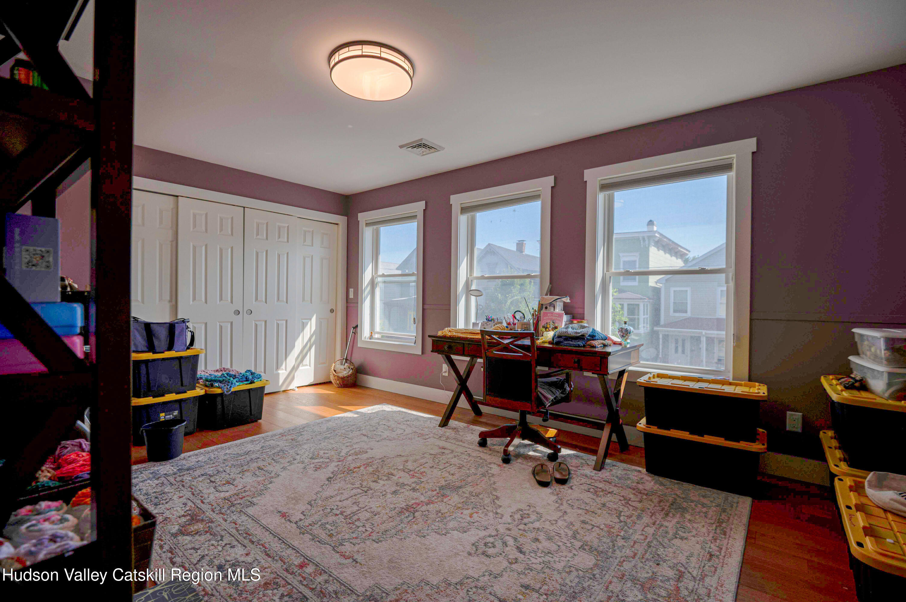 225 State Street, Unit RIGHT Hudson, NY 12534 - Photo 16 of 29 a view of a workspace with furniture and a window