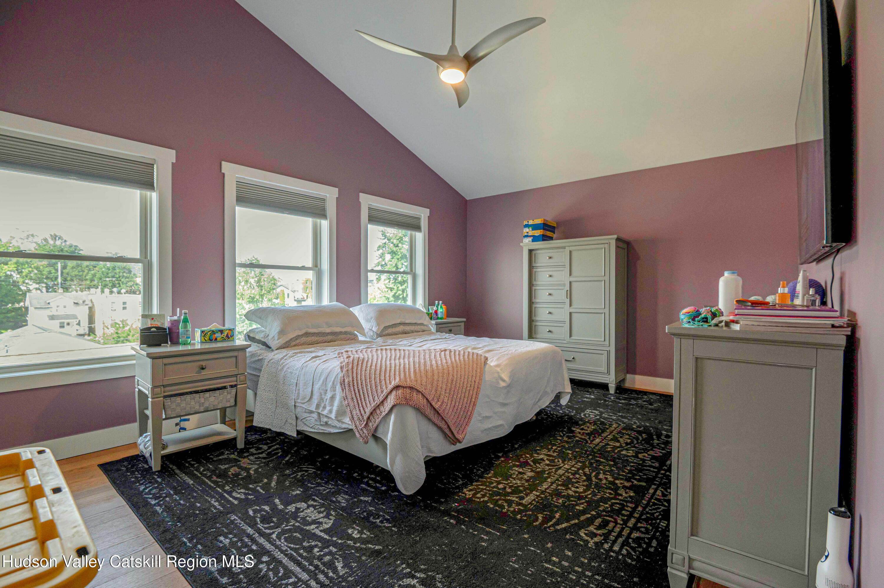 225 State Street, Unit RIGHT Hudson, NY 12534 - Photo 20 of 29 a bed room with a bed and a window