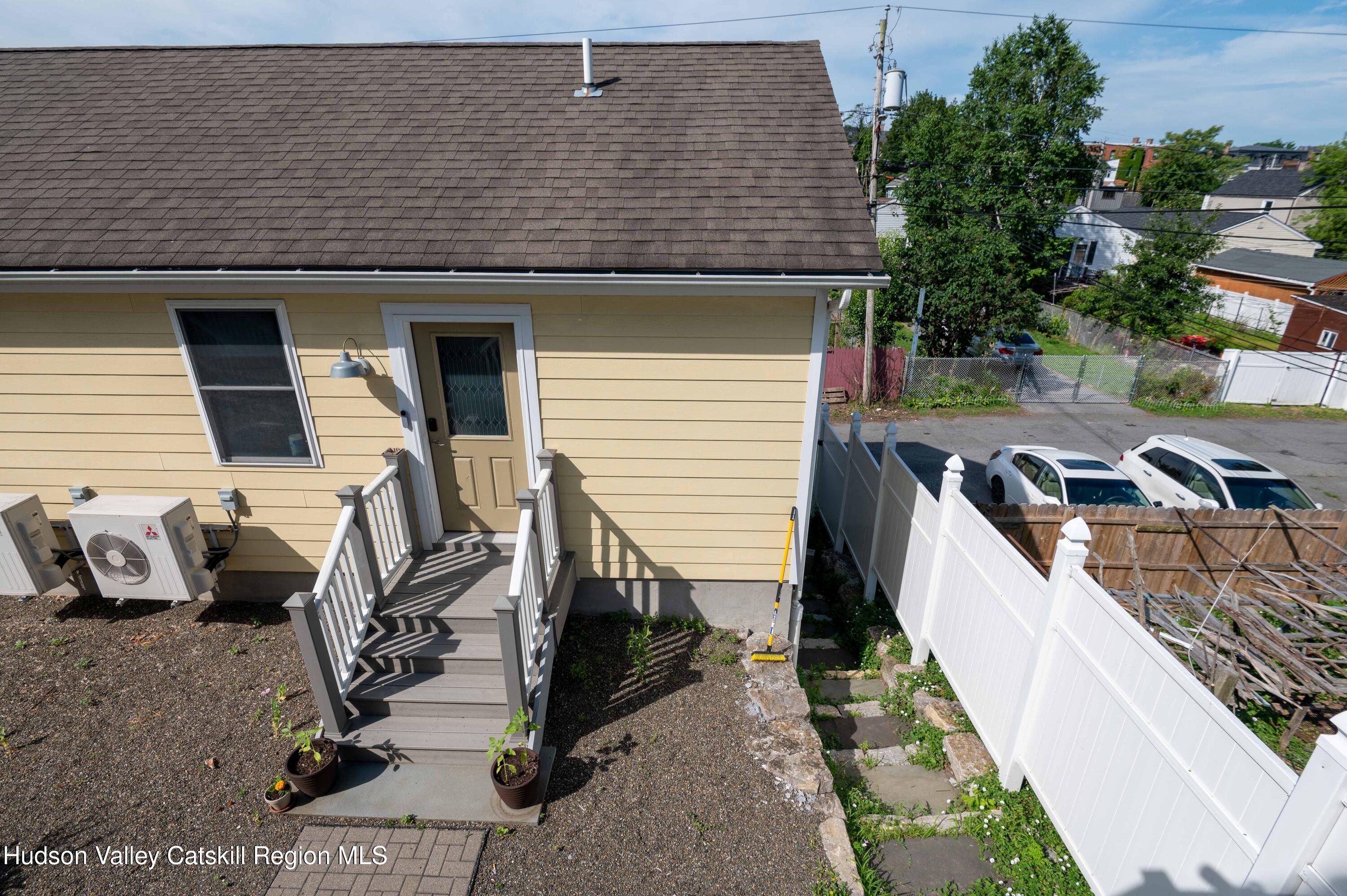 225 State Street, Unit RIGHT Hudson, NY 12534 - Photo 26 of 29 a view of a house with backyard