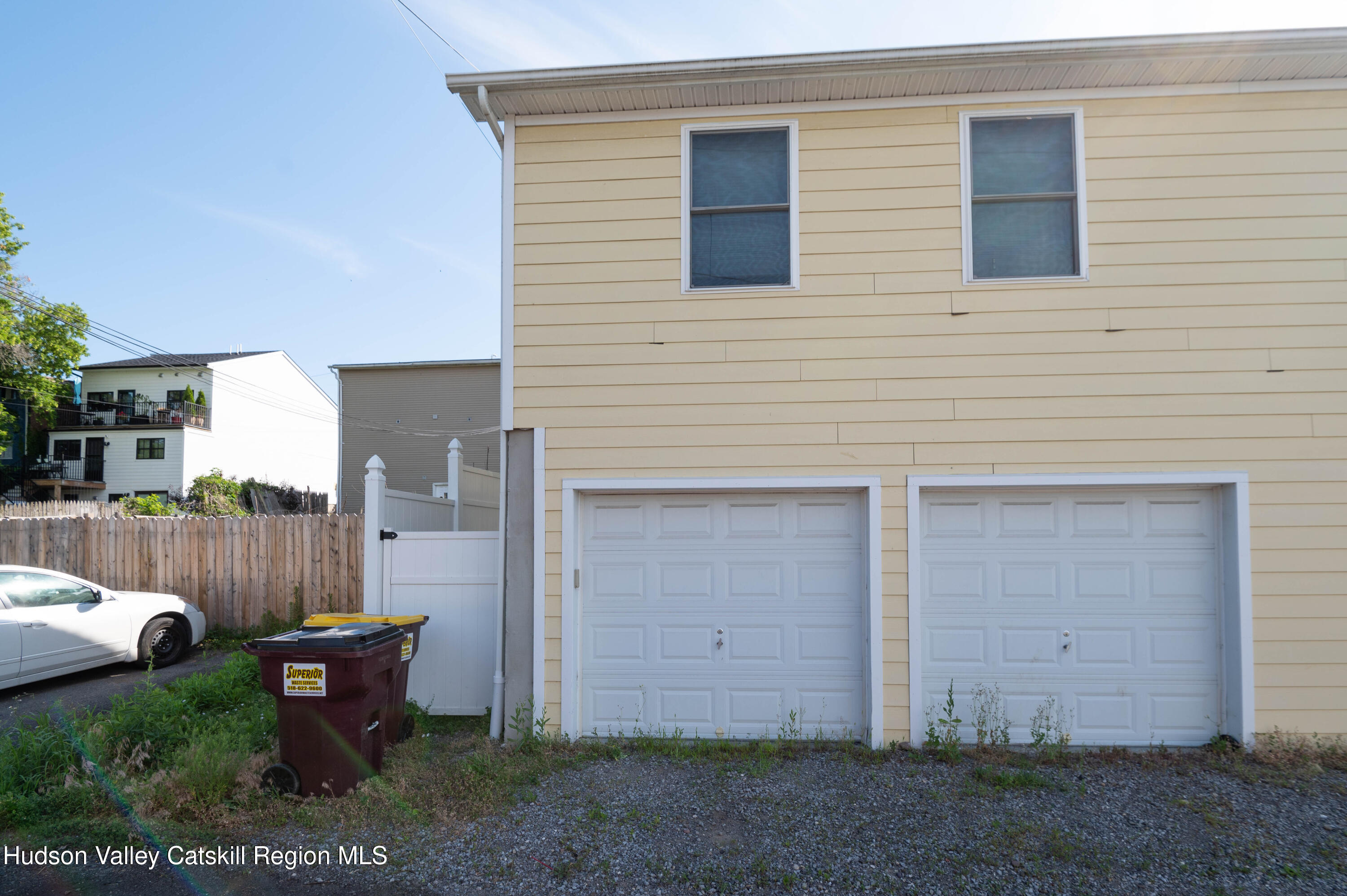 225 State Street, Unit RIGHT Hudson, NY 12534 - Photo 4 of 29 a backyard of a house with outdoor seating