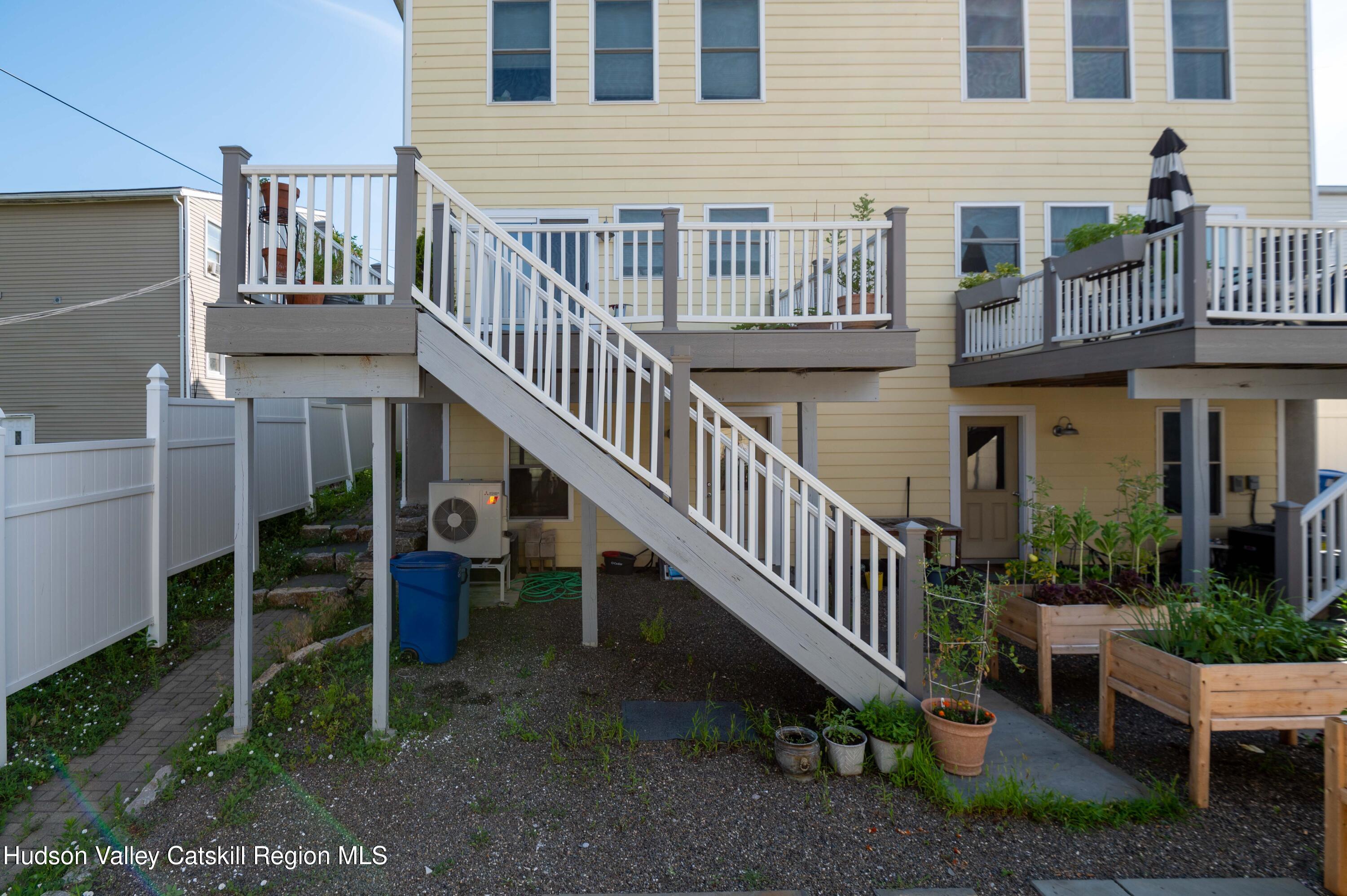 225 State Street, Unit RIGHT Hudson, NY 12534 - Photo 5 of 29 a view of a house with backyard and porch