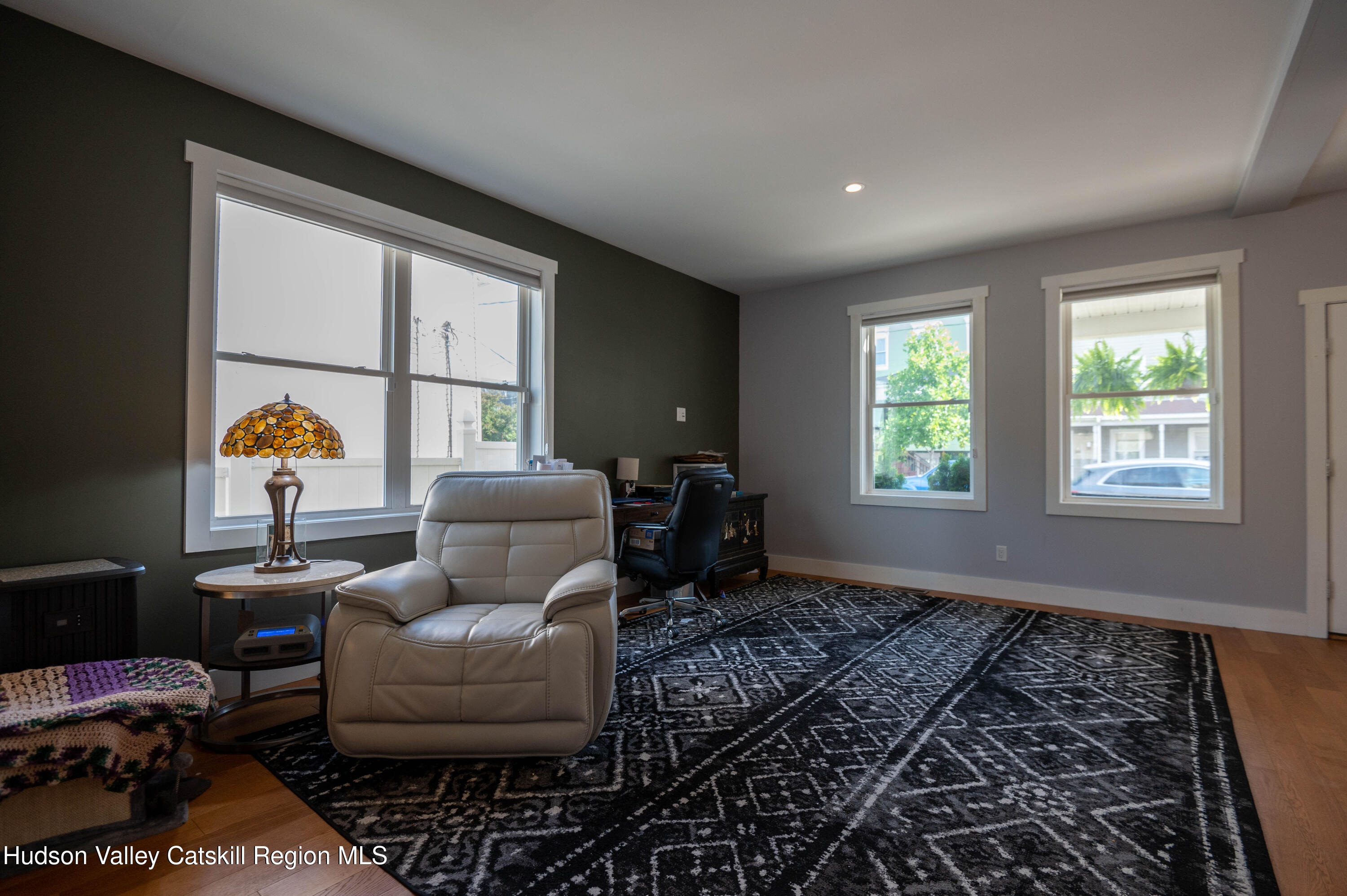 225 State Street, Unit RIGHT Hudson, NY 12534 - Photo 7 of 29 a living room with furniture and a window