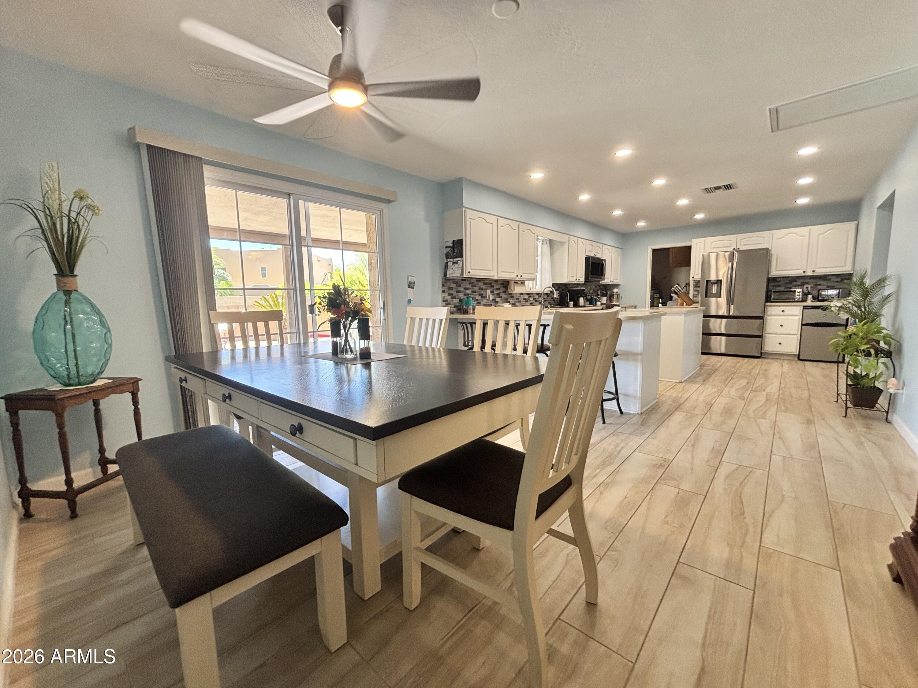 7745 East Mangun Road Mesa, AZ 85207 - Photo 19 of 35 a view of a dining room with furniture