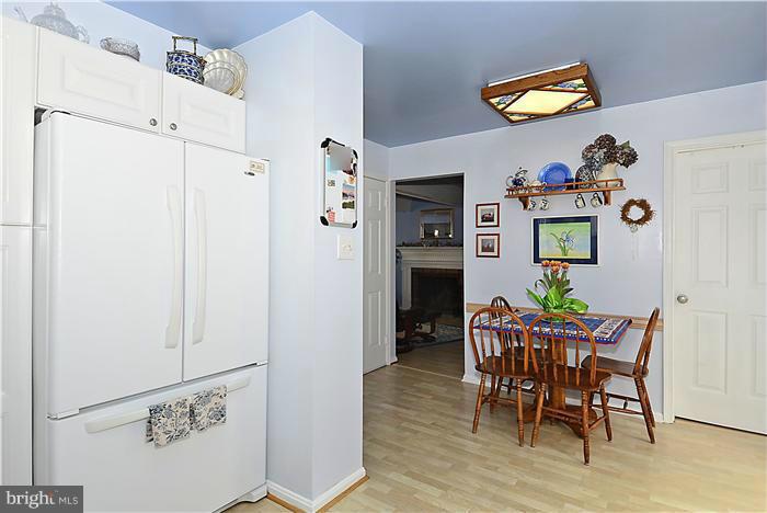 14424 Basingstoke Lane Silver Spring, MD 20905 - Photo 12 of 29 a view of a dining room with furniture