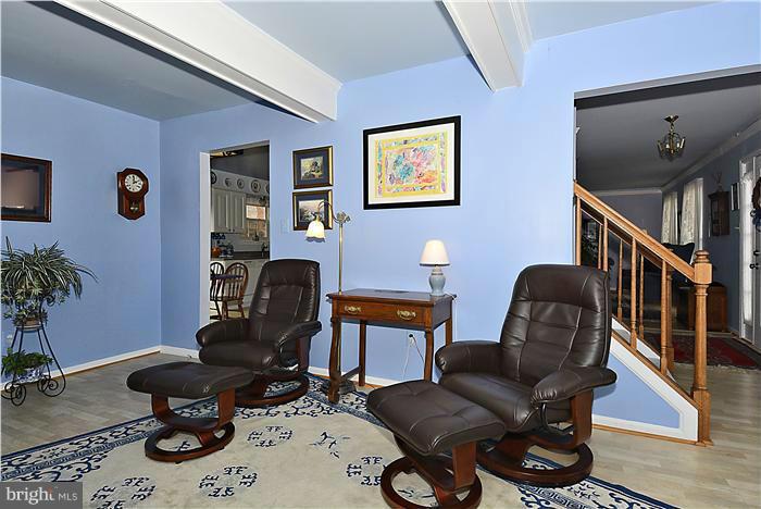 14424 Basingstoke Lane Silver Spring, MD 20905 - Photo 15 of 29 a work room with furniture and wooden floor
