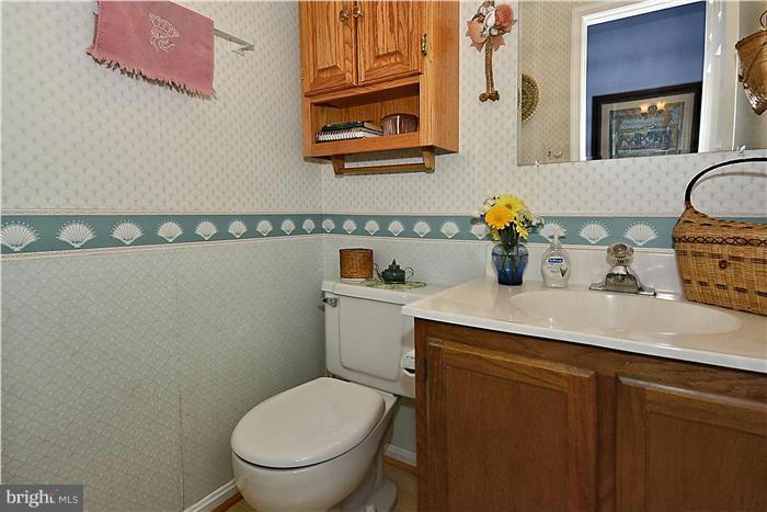 14424 Basingstoke Lane Silver Spring, MD 20905 - Photo 17 of 29 a bathroom with a sink and a toilet