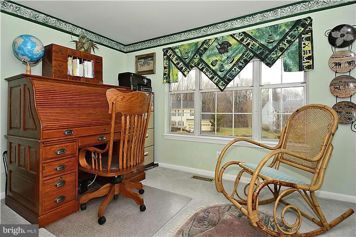 14424 Basingstoke Lane Silver Spring, MD 20905 - Photo 26 of 29 a view of a chair near a window
