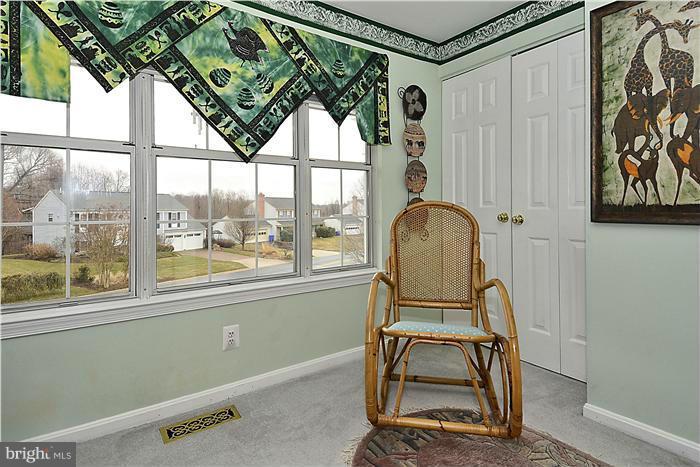 14424 Basingstoke Lane Silver Spring, MD 20905 - Photo 27 of 29 a room with window and furniture
