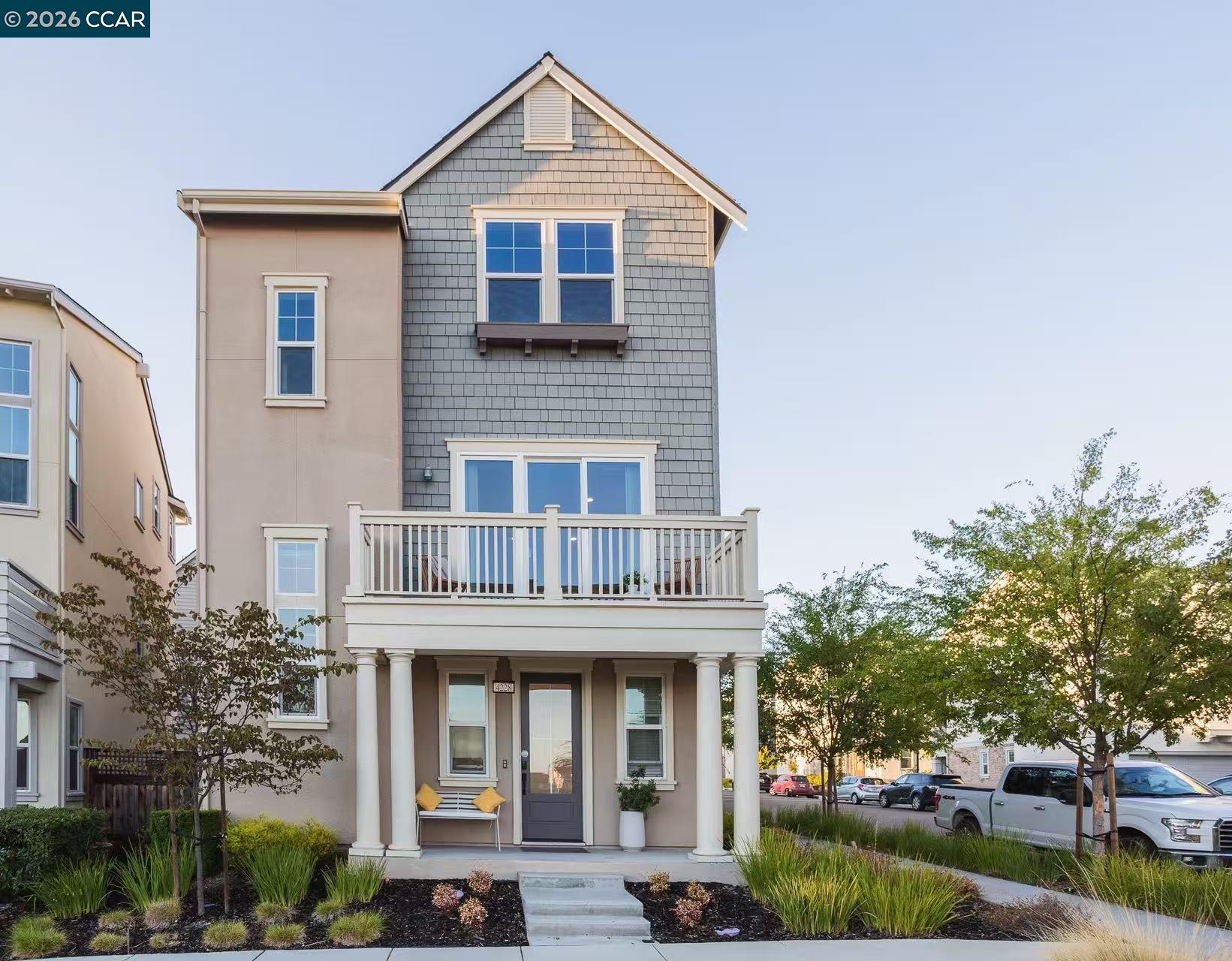 a front view of a house with garden