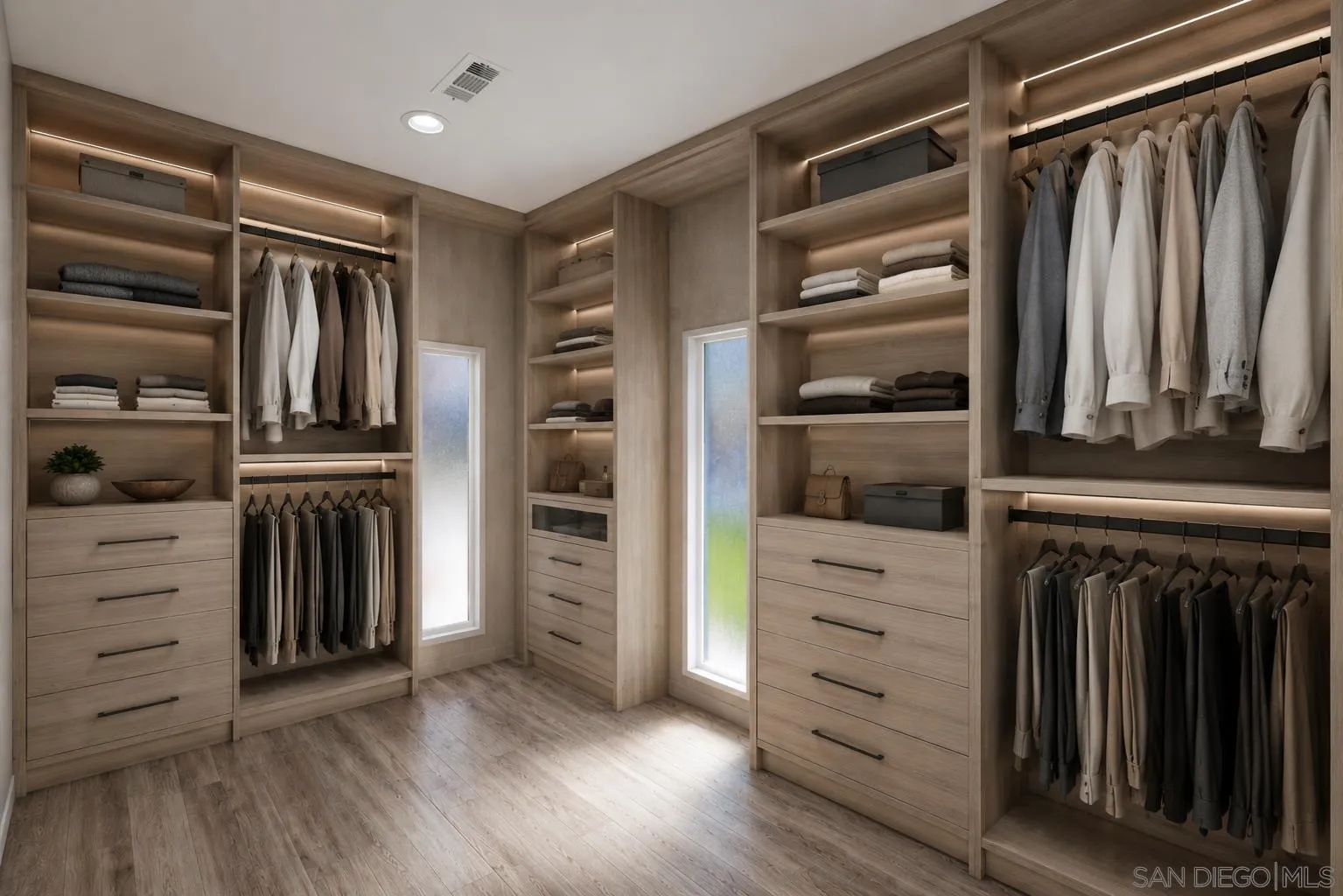 521 Rancho Camino Fallbrook, CA 92028 - Photo 31 of 72 a view of walk in closet with clothes and shoes