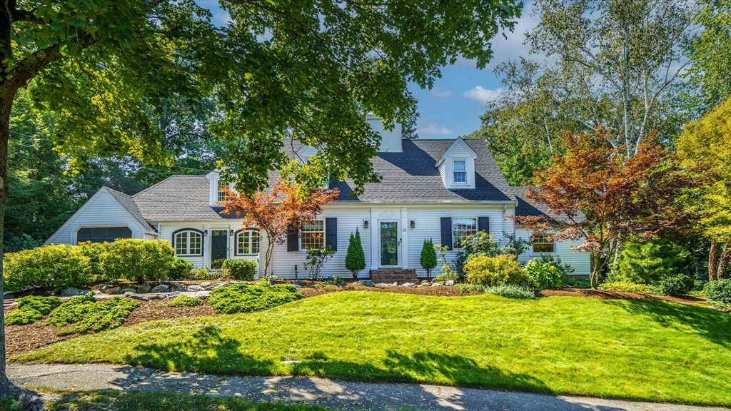 22 Puritan Road Newton, MA 02461 - Photo 1 of 37 a front view of a house with a yard