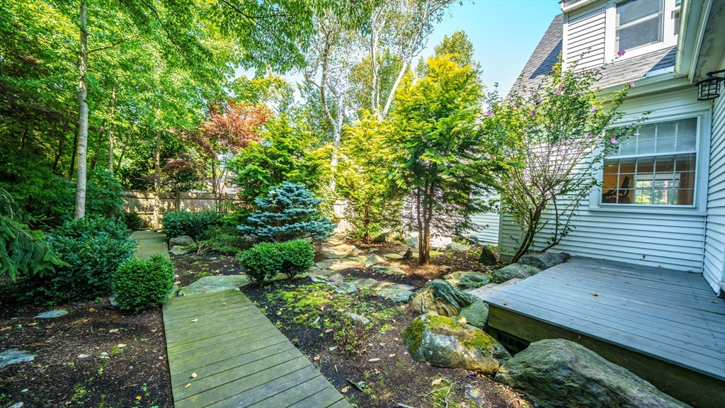 22 Puritan Road Newton, MA 02461 - Photo 5 of 37 a view of a backyard with sitting area