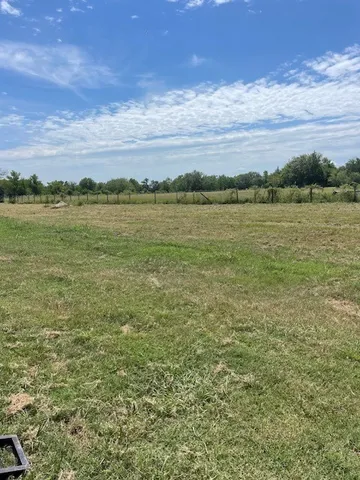 a view of a lake with a city