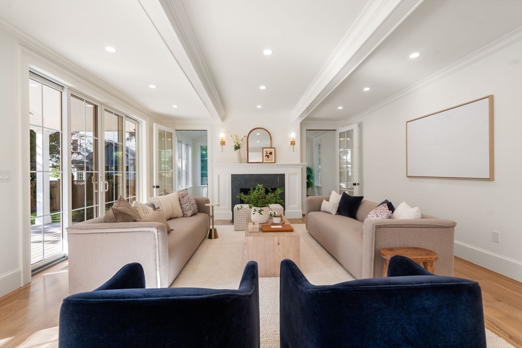 32 South Woodside Avenue Wellesley, MA 02482 - Photo 15 of 42 a living room with fireplace furniture and a large window