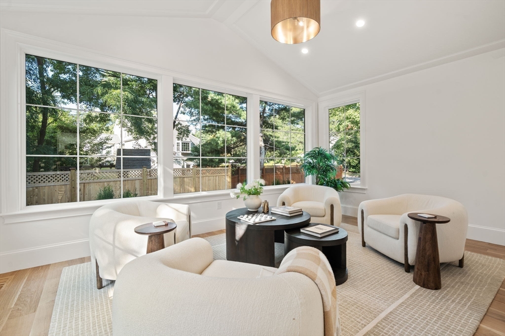 32 South Woodside Avenue Wellesley, MA 02482 - Photo 18 of 42 a living room with furniture and a large window