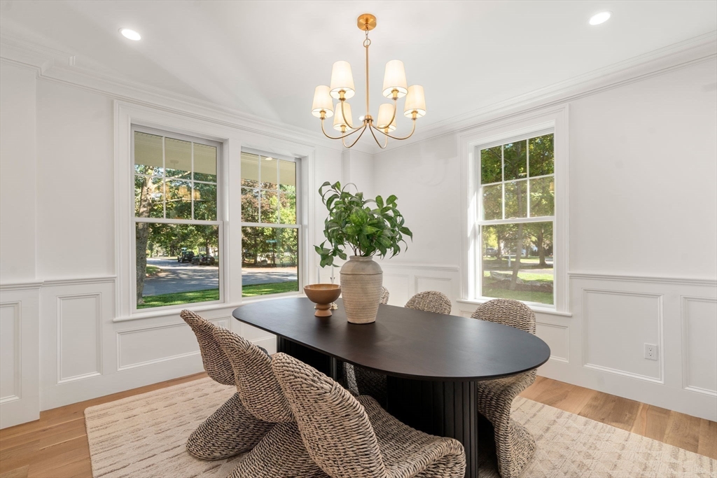 32 South Woodside Avenue Wellesley, MA 02482 - Photo 19 of 42 a view of a dining room with furniture window and wooden floor