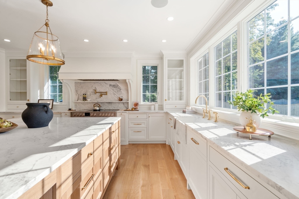 32 South Woodside Avenue Wellesley, MA 02482 - Photo 4 of 42 a kitchen with sink a stove and cabinets