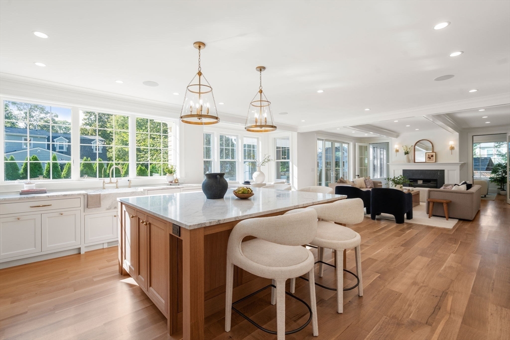 32 South Woodside Avenue Wellesley, MA 02482 - Photo 10 of 42 a open kitchen with sink cabinets and wooden floor