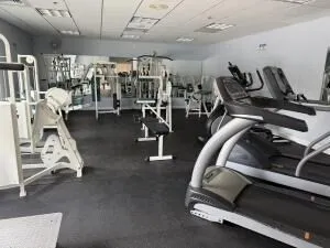 a view of a room with gym equipment