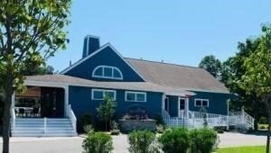 1 Upland Circle, Unit 1 Mashpee, MA 02649 - Photo 30 of 39 a front view of a house with garden