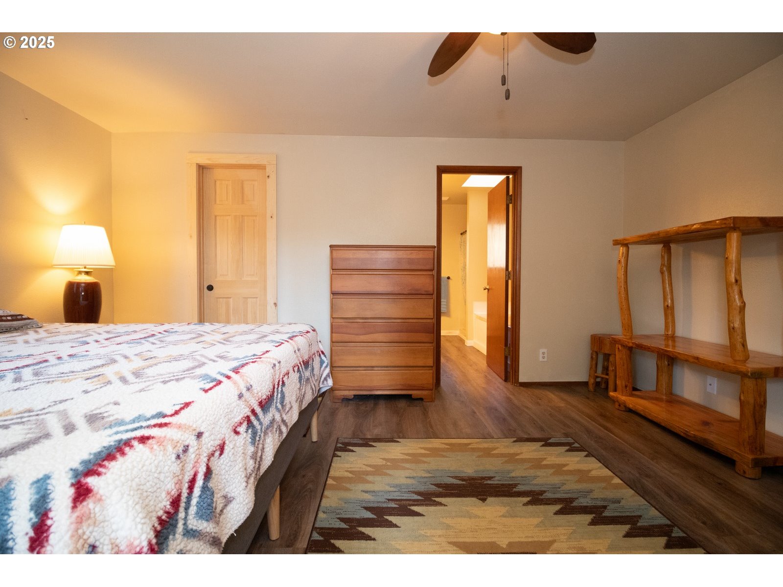 83694 Erhart Road Florence, OR 97439 - Photo 13 of 31 a bedroom with a bed and a dresser