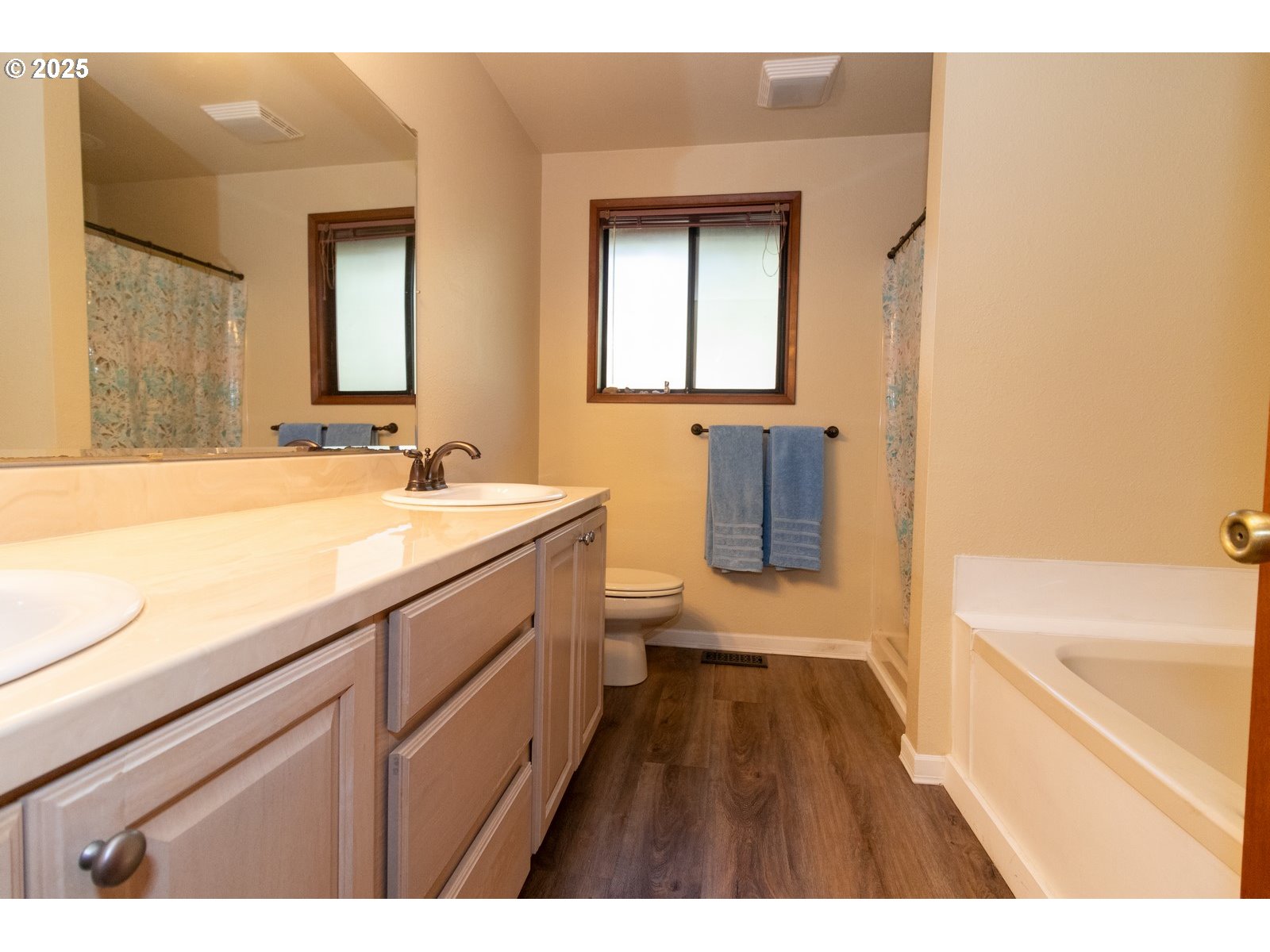 83694 Erhart Road Florence, OR 97439 - Photo 14 of 31 a spacious bathroom with a sink a bathtub and a shower